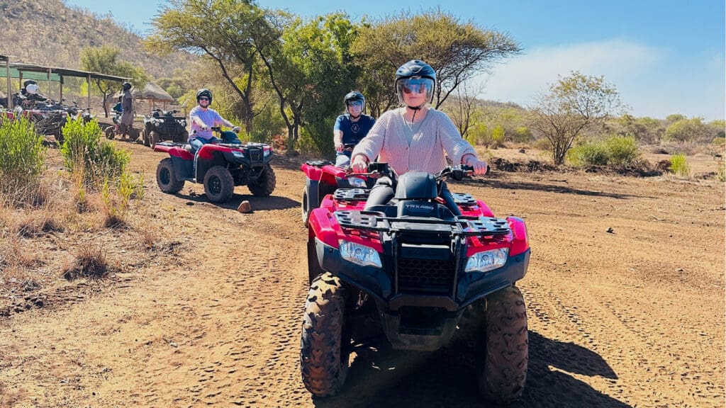 Family driving Quad Bike
